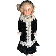 German  Bisque Armand Marseille Sweet Girl, Dolly Face,  with leather body