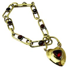 Stunning garnet bracelet with heart padlock