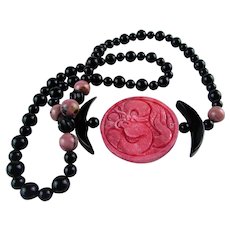 Vintage Necklace With Carved Rhodochrosite Medallion With Black Glass Bead Accents